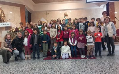 Los niños de primera comunión preparan la venida del niño Jesús